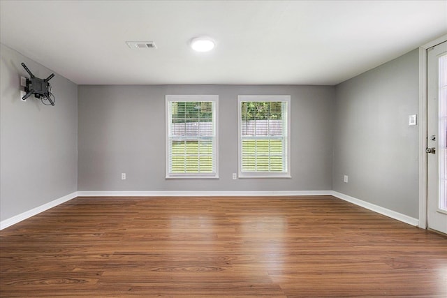 2826 Whitney Ave, Memphis, TN 38127 - empty room with dark wood finished floors and baseboards