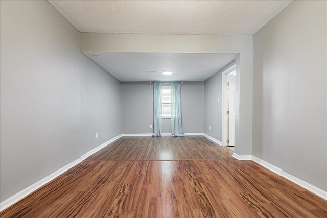 2826 Whitney Ave, Memphis, TN 38127 - empty room with wood finished floors and baseboards
