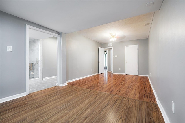 2826 Whitney Ave, Memphis, TN 38127 - unfurnished room featuring wood finished floors and baseboards