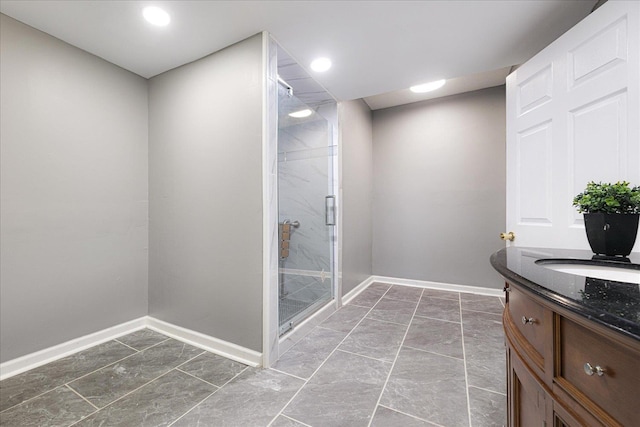2826 Whitney Ave, Memphis, TN 38127 - full bathroom featuring a shower stall, vanity, and marble finish flooring
