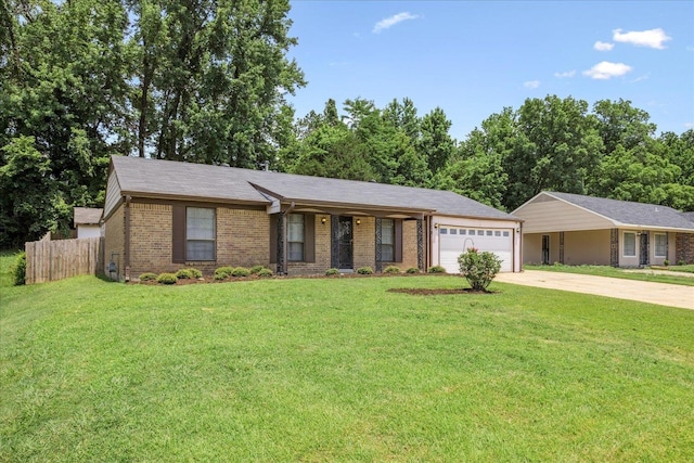 2826 Whitney Ave, Memphis, TN 38127 - ranch-style house featuring concrete driveway, brick siding, and an attached garage