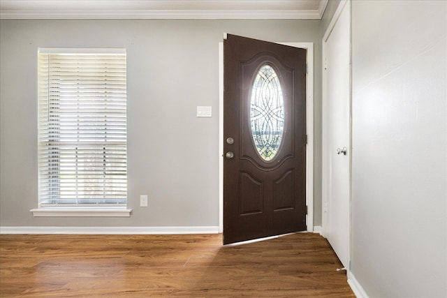 2826 Whitney Ave, Memphis, TN 38127 - entryway with ornamental molding, plenty of natural light, and wood finished floors
