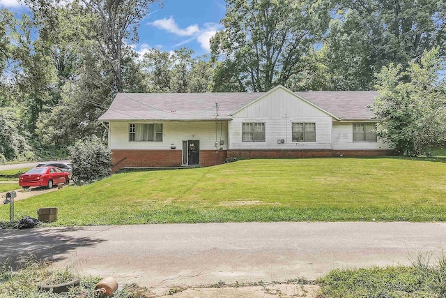 3593 Holland Dr, Memphis, TN 38127 - view of front of property with a front lawn and brick siding