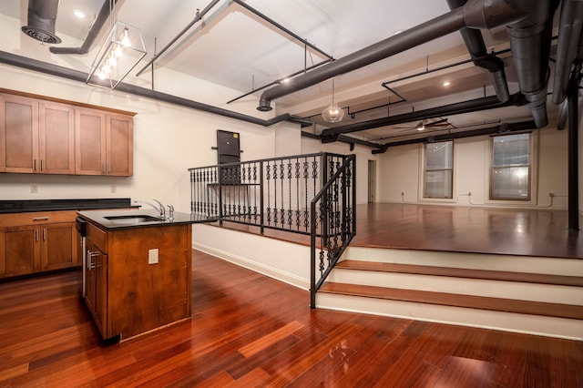 92 S Main St Unit 103, Memphis, TN 38103 - garage with a sink and baseboards