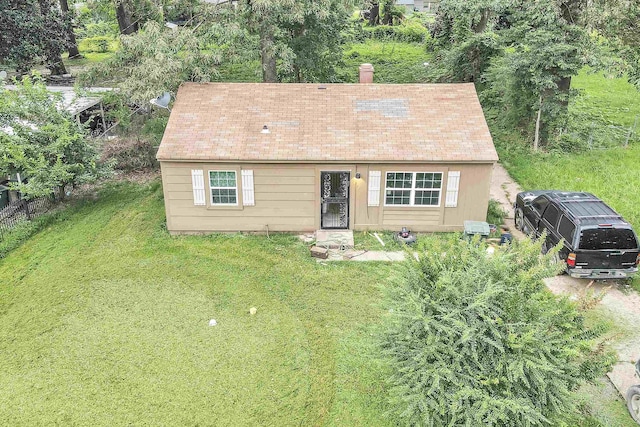 842 Restbrook Ave, Memphis, TN 38127 - view of front of house with a front lawn and a shingled roof