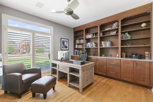 2912 Carnton Dr, Germantown, TN 38138 - office featuring light wood finished floors, ceiling fan, and healthy amount of natural light