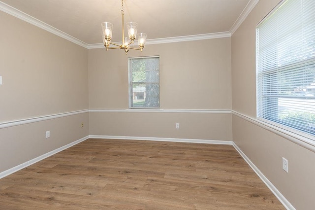 5153 Helene Rd, Memphis, TN 38117 - unfurnished room with ornamental molding, a chandelier, and wood finished floors
