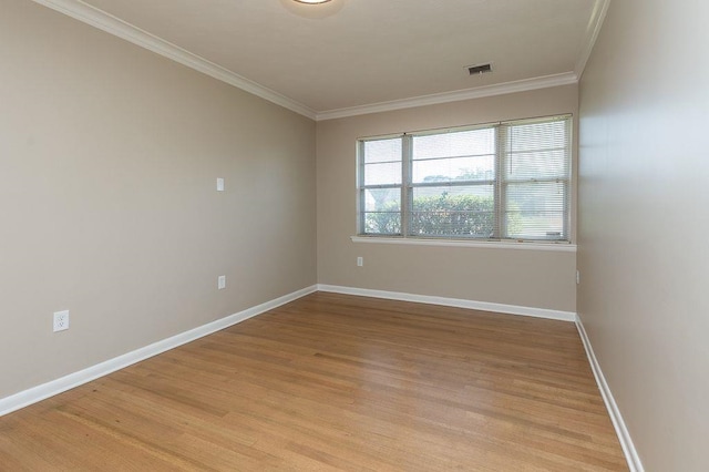 5153 Helene Rd, Memphis, TN 38117 - unfurnished room with crown molding and light wood-type flooring