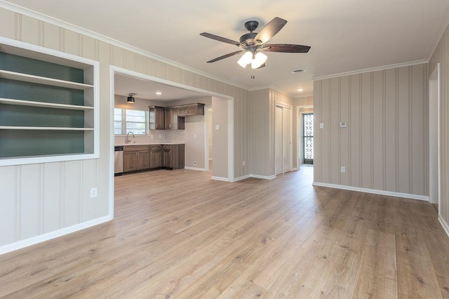 5153 Helene Rd, Memphis, TN 38117 - unfurnished living room with ornamental molding, a ceiling fan, and light wood finished floors