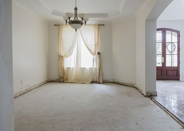 9219 Beaver Valley Ln, Cordova, TN 38018 - spare room with arched walkways, ornamental molding, a raised ceiling, and a chandelier