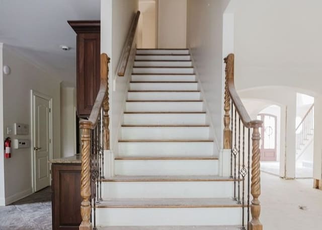 9219 Beaver Valley Ln, Cordova, TN 38018 - stairway featuring arched walkways