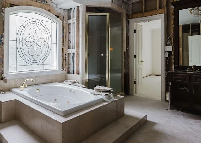 9219 Beaver Valley Ln, Cordova, TN 38018 - bathroom with vanity, a whirlpool tub, and a shower stall