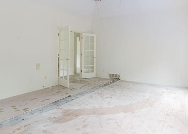 9219 Beaver Valley Ln, Cordova, TN 38018 - spare room featuring french doors