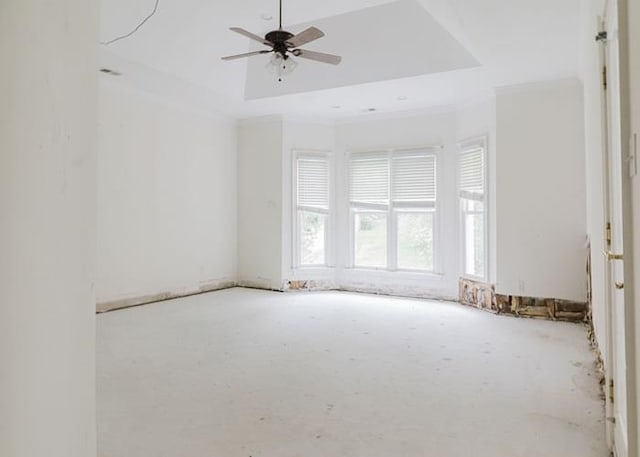 9219 Beaver Valley Ln, Cordova, TN 38018 - spare room featuring a tray ceiling, ceiling fan, and crown molding