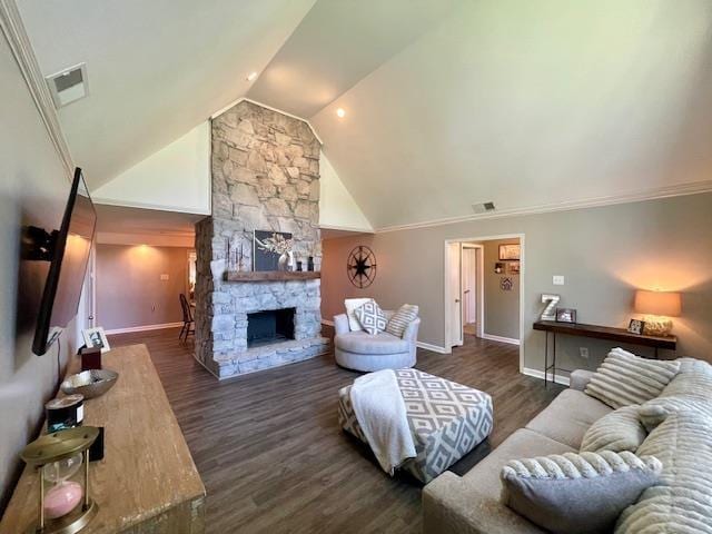 2470 S Flowering Tree Cv, Bartlett, TN 38134 - living area with dark wood-style floors, lofted ceiling, and a fireplace