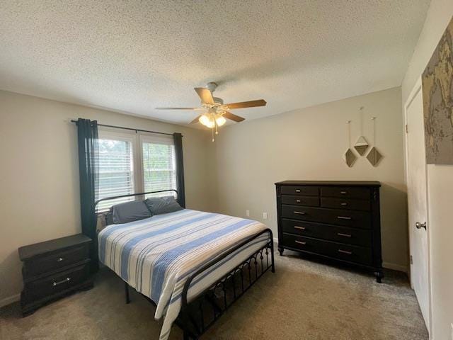2470 S Flowering Tree Cv, Bartlett, TN 38134 - bedroom featuring a textured ceiling, light carpet, and ceiling fan