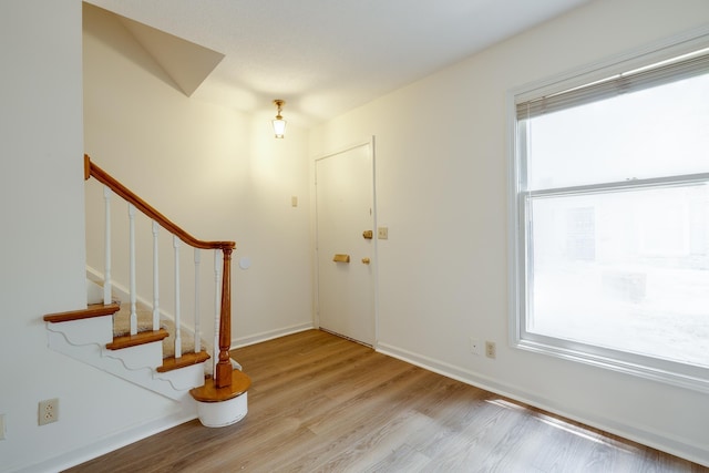1204 Chamberlain Dr Unit 10, Memphis, TN 38119 - entrance foyer featuring stairway and light wood-style floors