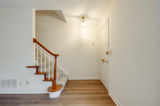 1204 Chamberlain Dr Unit 10, Memphis, TN 38119 - foyer entrance featuring light wood-style floors and stairs