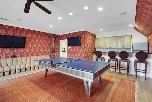 3217 Pointe Hill Cv, Memphis, TN 38125 - game room with wallpapered walls, a ceiling fan, light wood-style flooring, crown molding, and recessed lighting