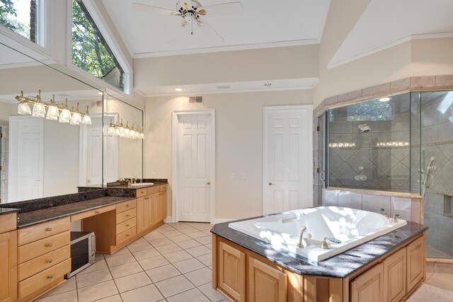 1426 Le Fleur Pl, Memphis, TN 38120 - full bath featuring tile patterned floors, a stall shower, a tub with jets, vanity, and crown molding