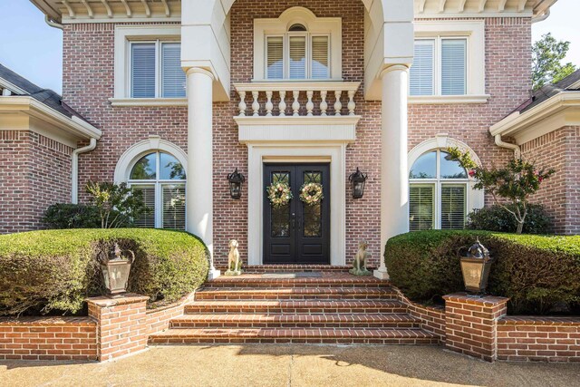 1426 Le Fleur Pl, Memphis, TN 38120 - doorway to property featuring brick siding and french doors