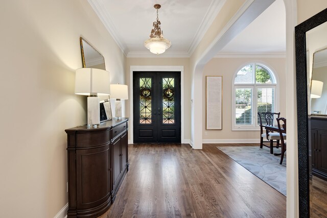 1426 Le Fleur Pl, Memphis, TN 38120 - foyer entrance with dark wood finished floors and crown molding