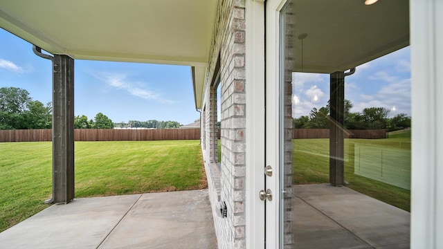 131 Pritchett Cv, Munford, TN 38058 - fenced backyard featuring a patio