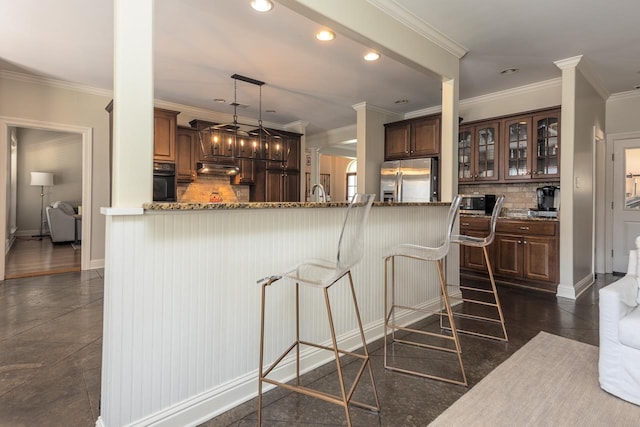 437 Duscoe St, Collierville, TN 38017 - kitchen with stainless steel refrigerator with ice dispenser, oven, decorative backsplash, glass insert cabinets, and recessed lighting