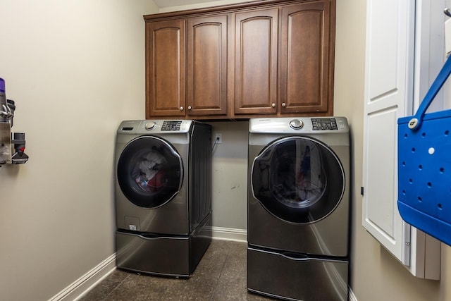 437 Duscoe St, Collierville, TN 38017 - washroom featuring independent washer and dryer and cabinet space