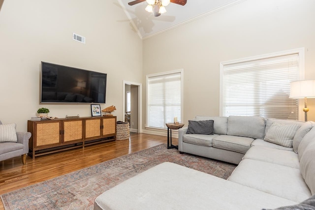437 Duscoe St, Collierville, TN 38017 - living area featuring ornamental molding, wood finished floors, a ceiling fan, and high vaulted ceiling