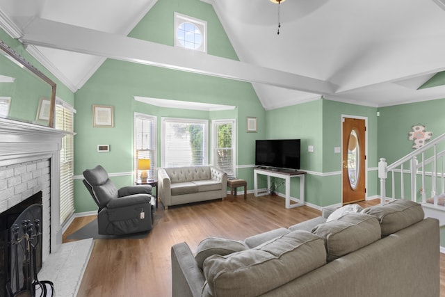 526 Royal Pecan Way, Collierville, TN 38017 - living room with a brick fireplace, wood finished floors, crown molding, stairway, and a ceiling fan