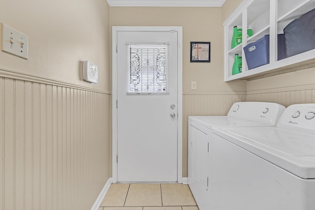 4833 Beaconfield Cv, Memphis, TN 38141 - washroom featuring separate washer and dryer, wainscoting, light tile patterned floors, and ornamental molding
