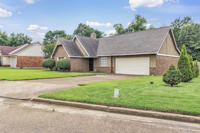 4833 Beaconfield Cv, Memphis, TN 38141 - view of front of house featuring asphalt driveway, brick siding, a garage, a front yard, and a chimney