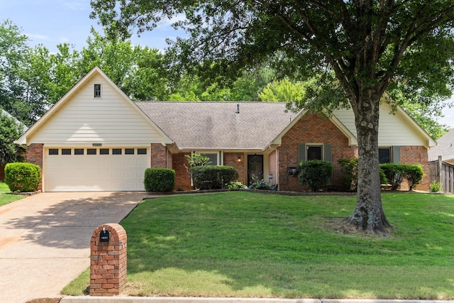 1504 Teal Wing Ln, Memphis, TN 38016 - ranch-style house with brick siding, concrete driveway, a garage, and roof with shingles