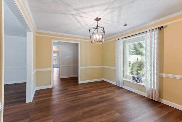 1504 Teal Wing Ln, Memphis, TN 38016 - unfurnished dining area featuring a chandelier, dark wood-style floors, a textured ceiling, and ornamental molding