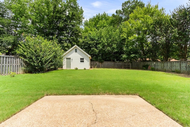 1504 Teal Wing Ln, Memphis, TN 38016 - fenced backyard with a patio area and an outdoor structure