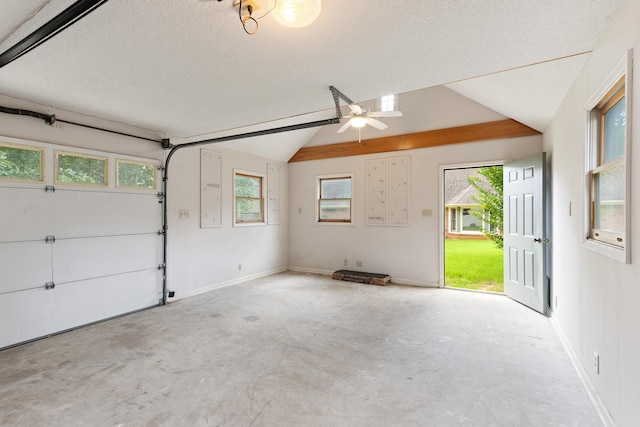 1504 Teal Wing Ln, Memphis, TN 38016 - garage with a ceiling fan and baseboards
