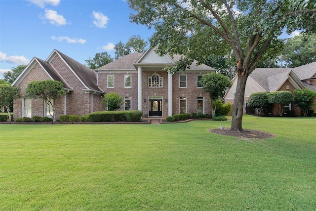 1775 Lisson Cv, Collierville, TN 38017 - greek revival house with brick siding and a front lawn