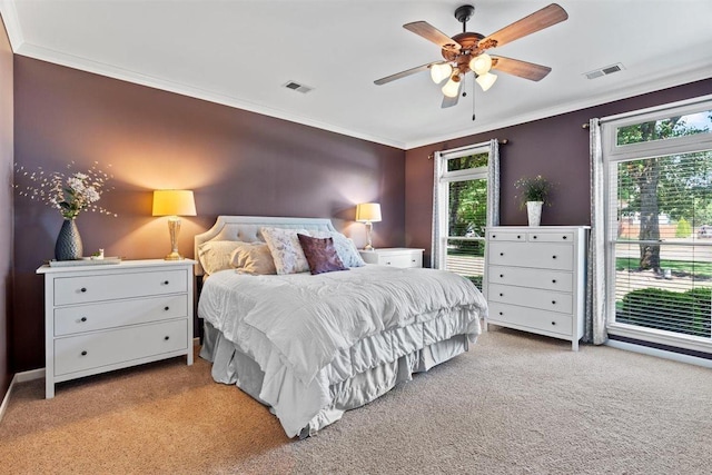 1775 Lisson Cv, Collierville, TN 38017 - bedroom with multiple windows, ornamental molding, carpet floors, and ceiling fan