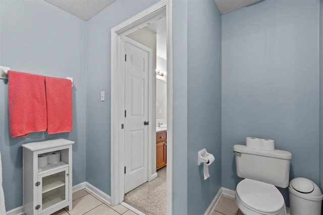 1775 Lisson Cv, Collierville, TN 38017 - bathroom featuring vanity, a textured ceiling, and tile patterned floors