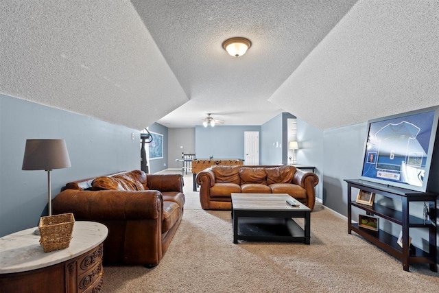 1775 Lisson Cv, Collierville, TN 38017 - living area featuring a textured ceiling, light carpet, lofted ceiling, and ceiling fan