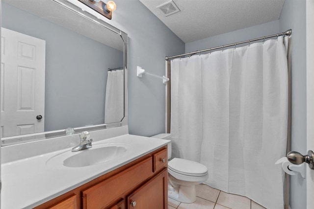 1775 Lisson Cv, Collierville, TN 38017 - bathroom featuring tile patterned floors, vanity, and a textured ceiling