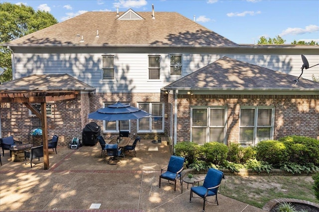 1775 Lisson Cv, Collierville, TN 38017 - rear view of house with a patio area, brick siding, and a shingled roof
