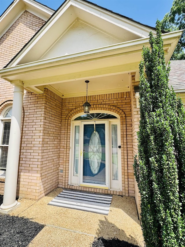902 Wildbird Cv, Collierville, TN 38017 - doorway to property featuring brick siding