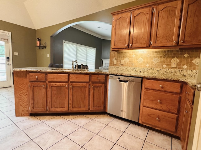 902 Wildbird Cv, Collierville, TN 38017 - kitchen featuring dishwasher, arched walkways, brown cabinetry, a peninsula, and crown molding