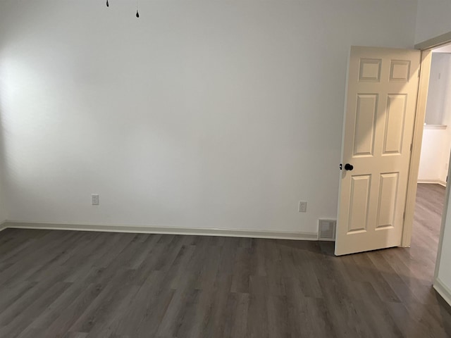 1319 E Island Pl E, Memphis, TN 38103 - unfurnished room with dark wood finished floors and baseboards