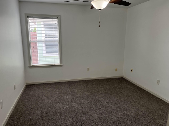 1319 E Island Pl E, Memphis, TN 38103 - carpeted empty room featuring a ceiling fan and baseboards