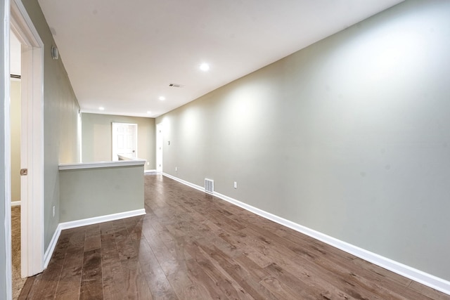 71 Clark Pl, Memphis, TN 38104 - unfurnished room with dark wood-style flooring and recessed lighting