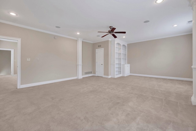 1160 Harbor River Cv, Memphis, TN 38103 - empty room with light colored carpet, ceiling fan, recessed lighting, ornamental molding, and ornate columns