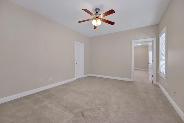 1160 Harbor River Cv, Memphis, TN 38103 - spare room featuring a ceiling fan and light colored carpet